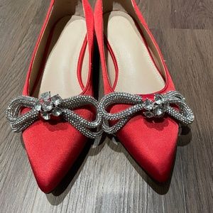 Brand new red pointed toe flats with bow